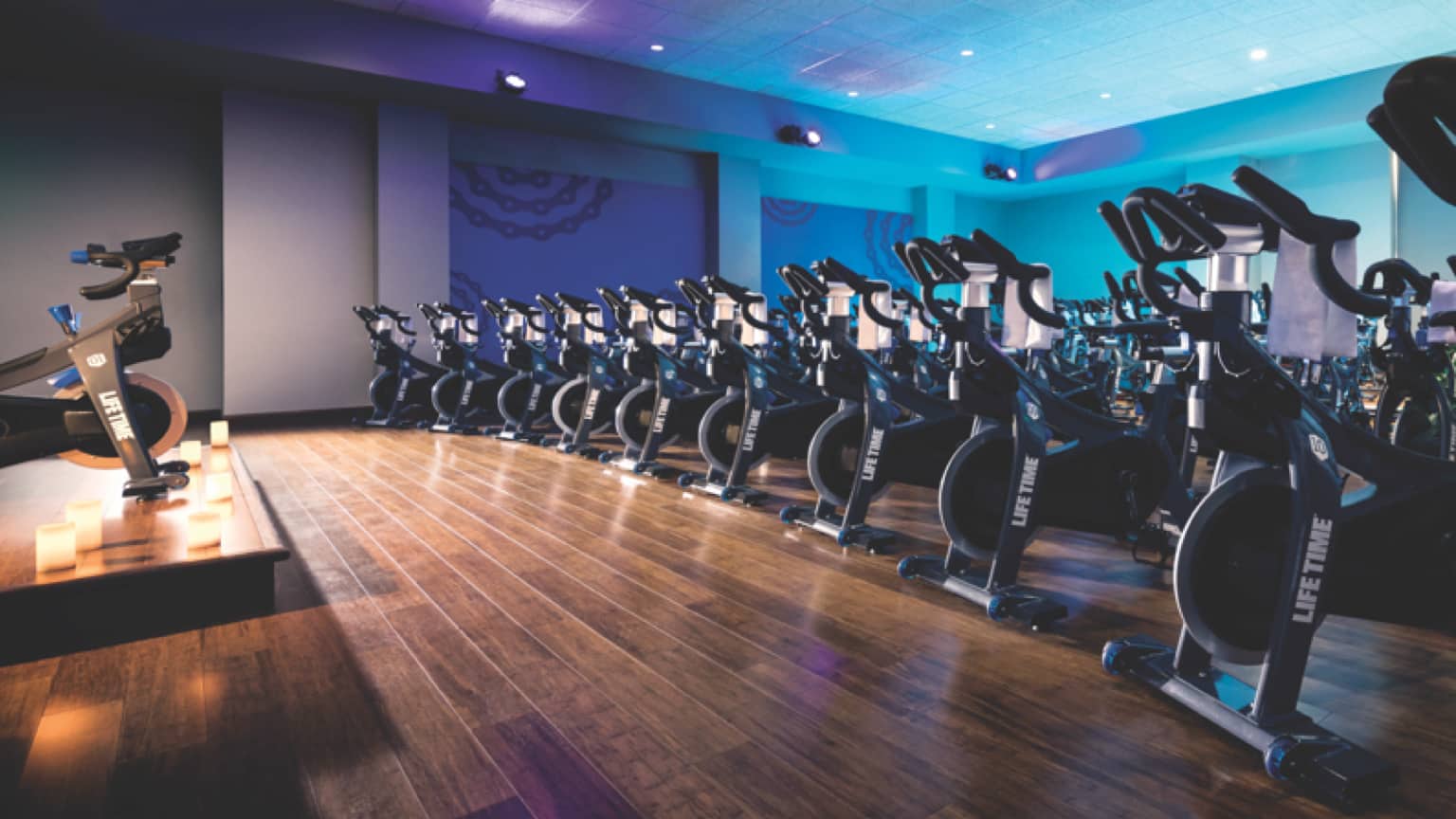 An indoor cycle studio at a Life Time Athletic Resort and Spa