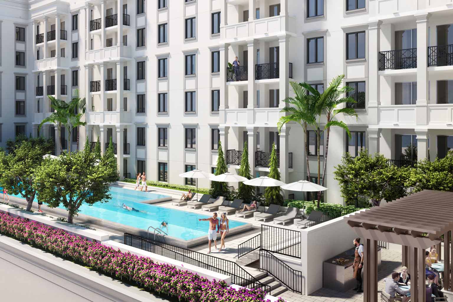Life Time Living residents enjoy a sunny day in an outdoor courtyard at the Life Time Living in Coral Gables, Florida