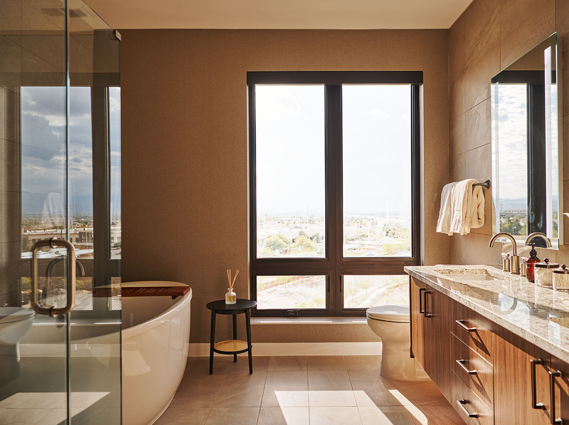 Elegant, modern bathroom with sink, shower and bathtub
